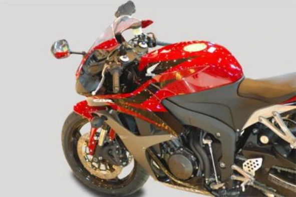 A carenagem, que envolve o motociclo, tem como função: — pergunta R8Q0024 do exame de código IMT